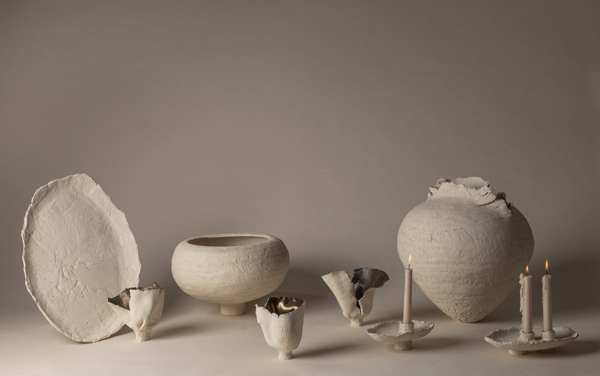 Soft Cream ceramic collection with single and double candle trays alongside vessels and a large tray; each piece is sold individually.