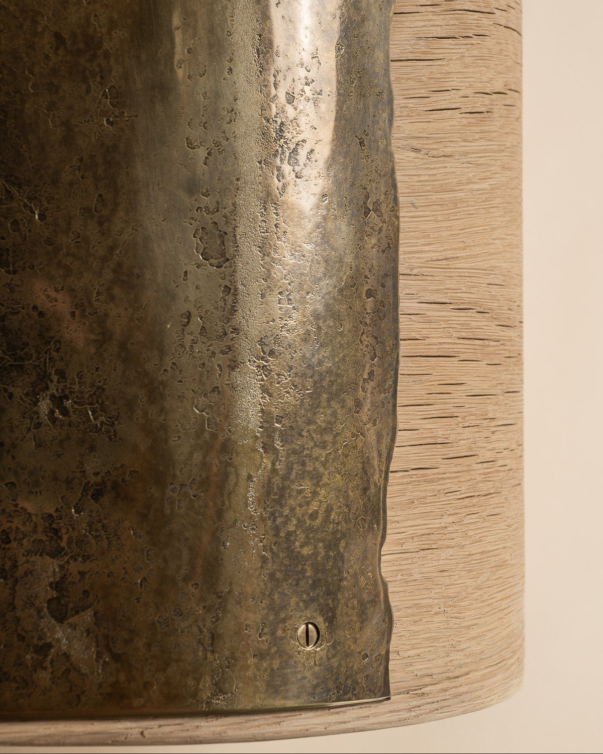 Close-up of the edge and patina of Veil's brass seat.