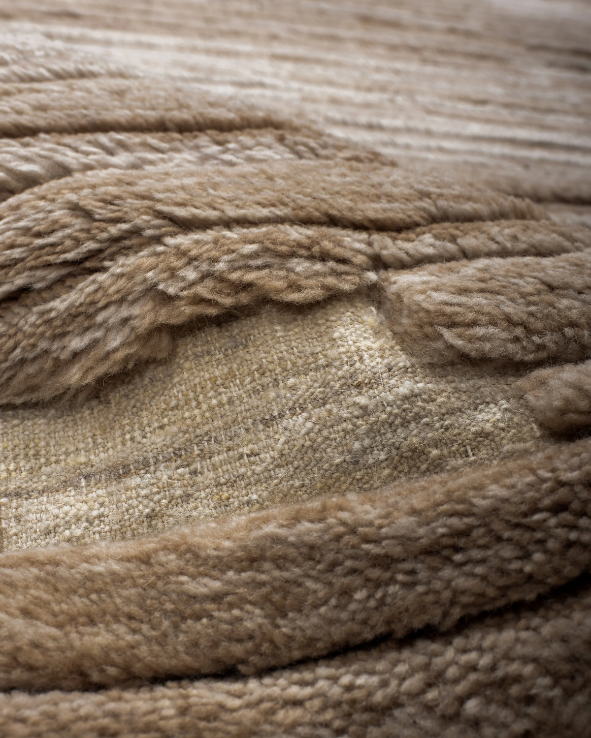 Placeholder photograph: close-up of raised rug pile and exposed woven foundation.
